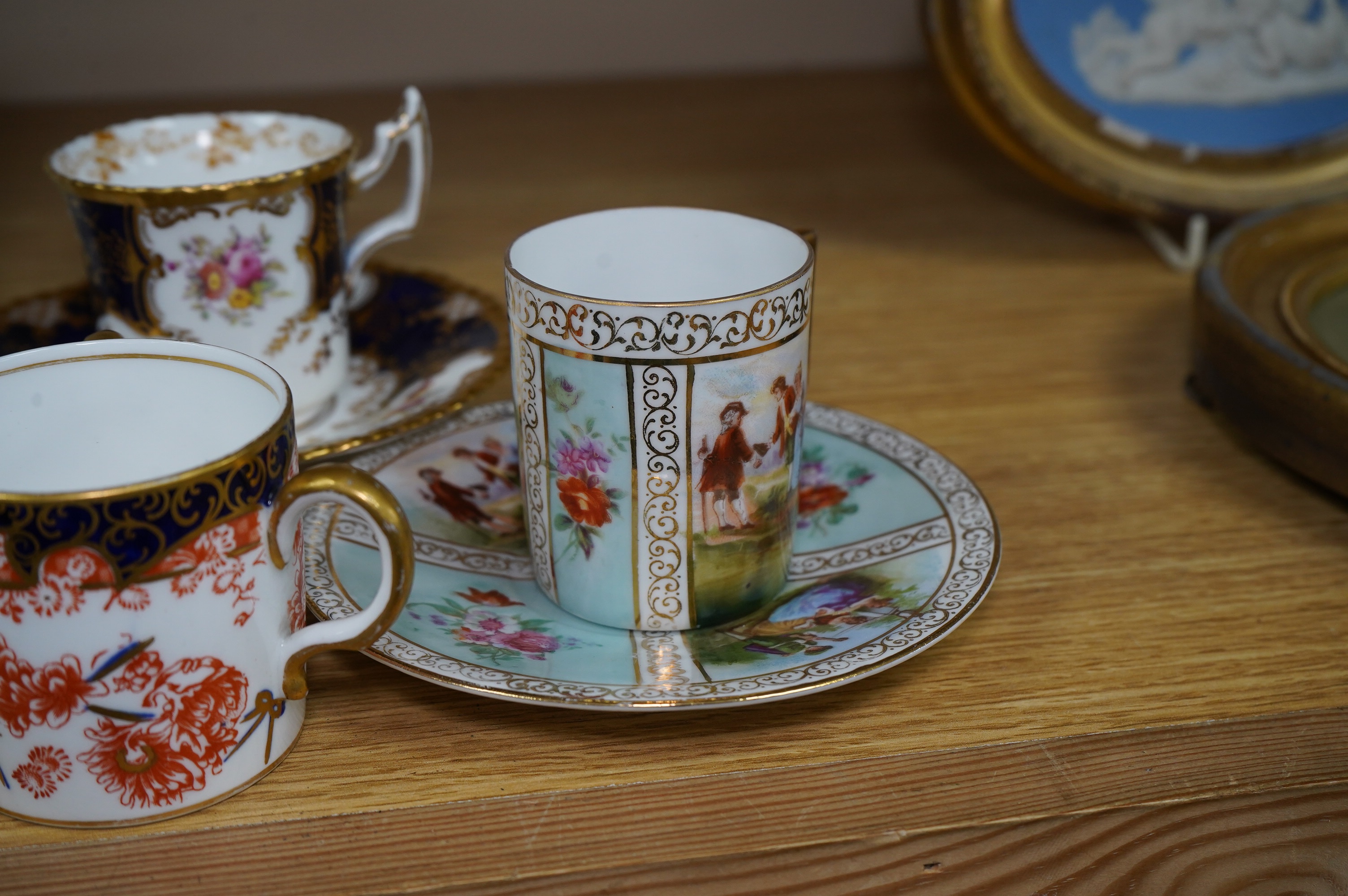 Porcelain and cloisonné ware to include a box and cover, a modern cloisonne dish, Royal crown Derby tygs and two cups and saucers, largest 10cm high. Condition - fair to good